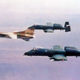A MiG 23MS (“YF-113C”) belonging to the 4477th Test and Evaluation Squadron leads a pair of US A-10 attack planes painted in European green livery (US Air Force)